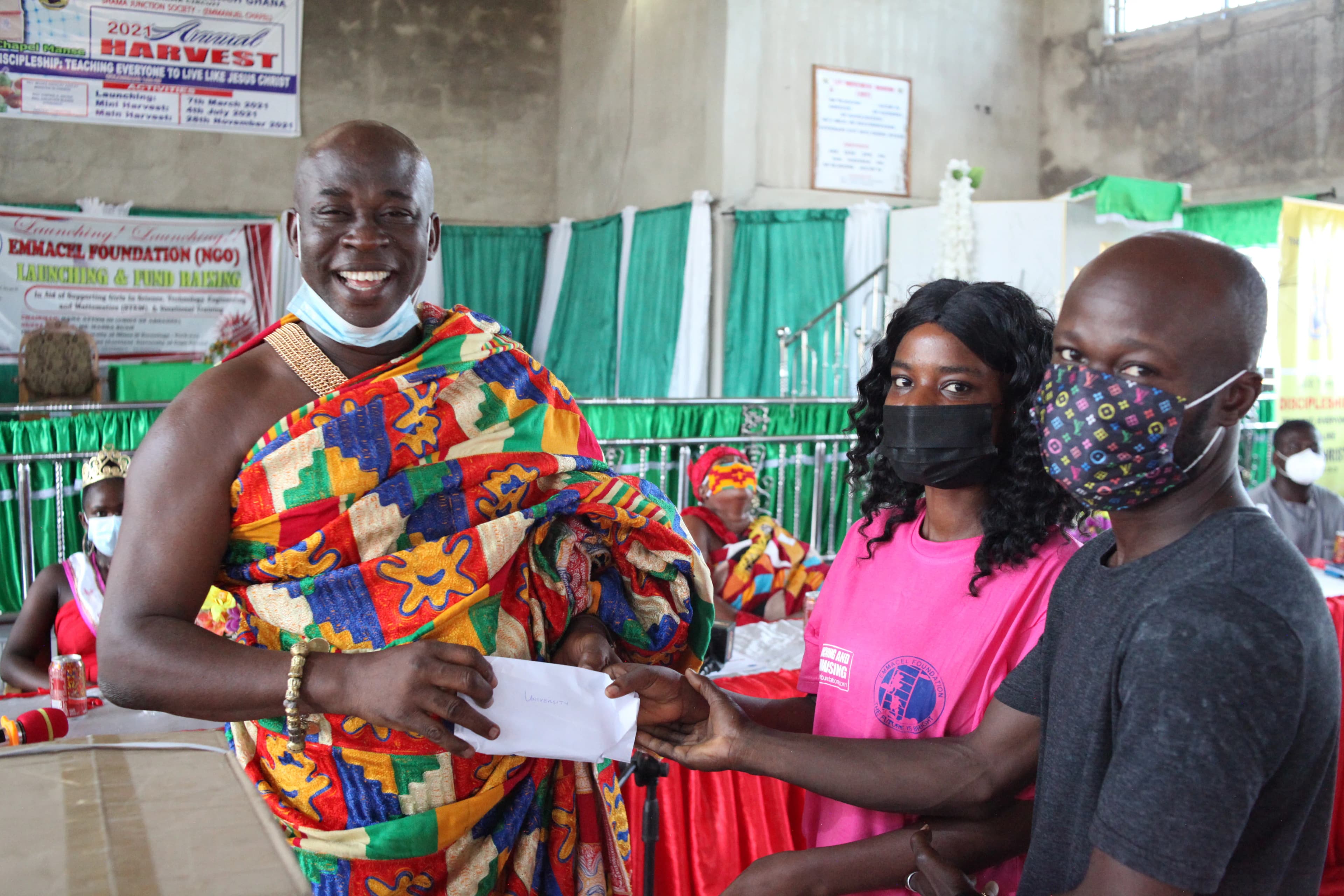 The late Nana Attom III presenting a scholarship award to a STEM student