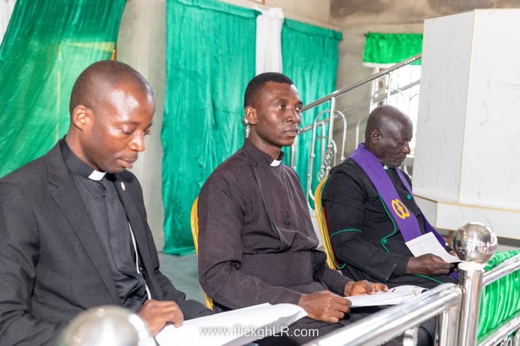 Ministers reviewing programmes during a recognition and ministry gathering.