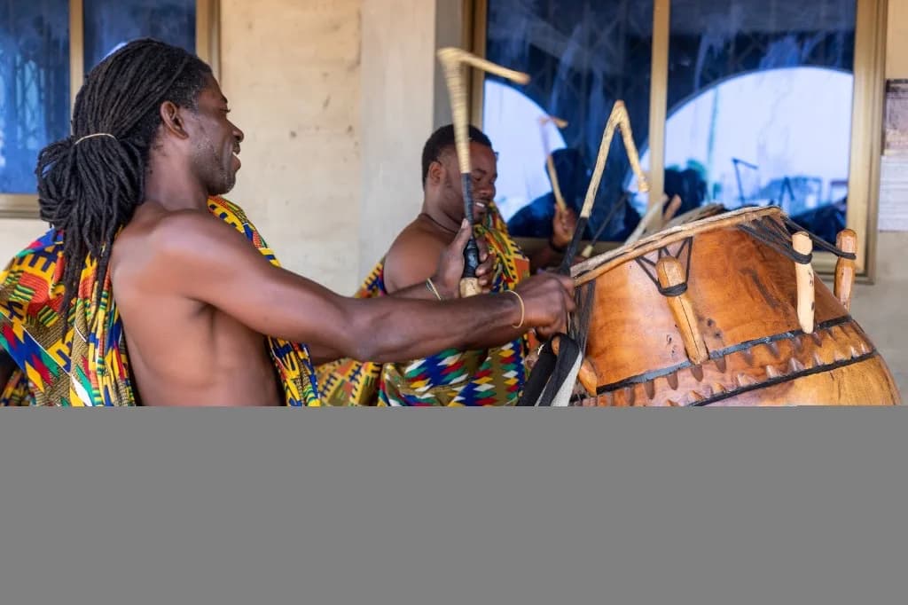 Joyful traditional drumming celebrating culture and community.